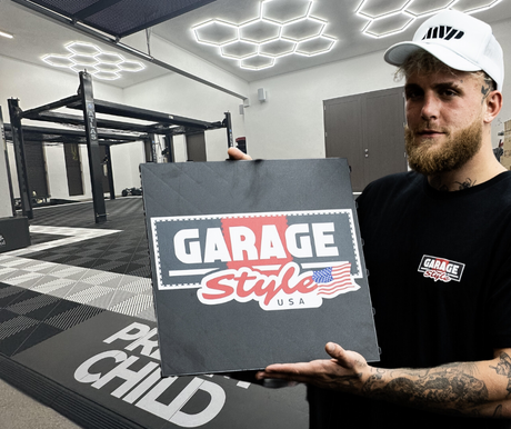 Jake Paul Holding a Garage Style USA Vented Tile